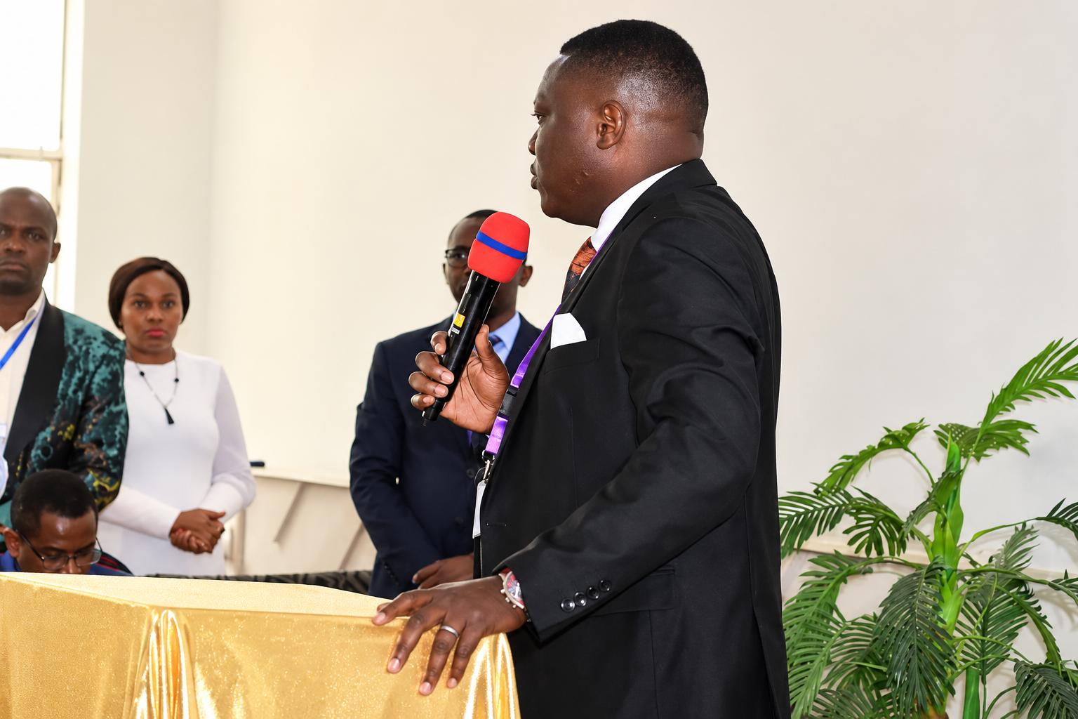 Apostle Ronald Asava Kasule of jhcim in conference